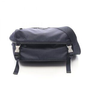 Prada shoulder bag side release buckles on the front flap